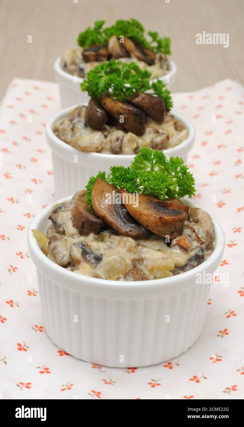 Mushrooms in a creamy sauce Stock Photo - Alamy