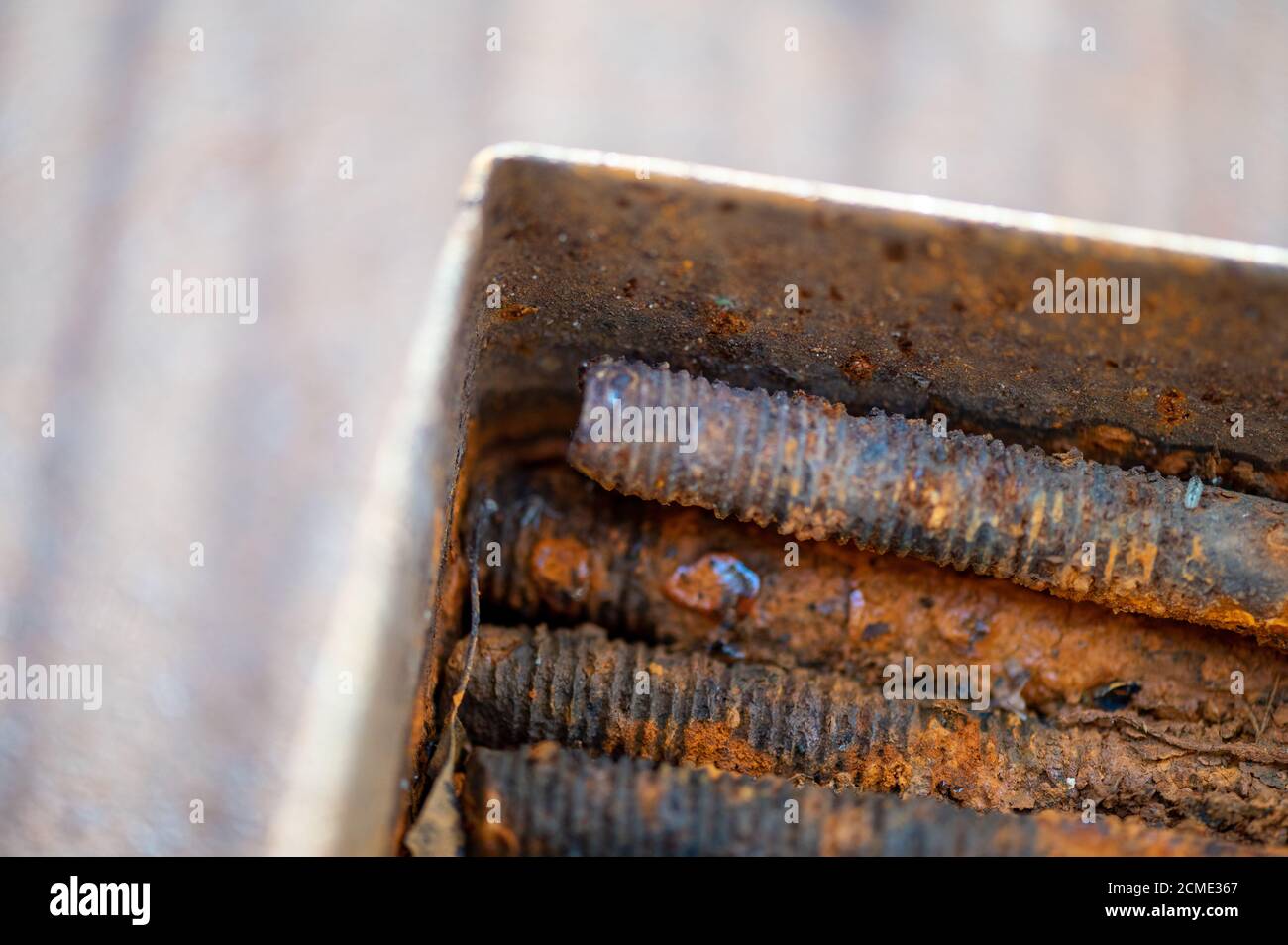 Metal Stud Rusting Old metal studs covered in rust, close-up, selective focus Stock Photo ...