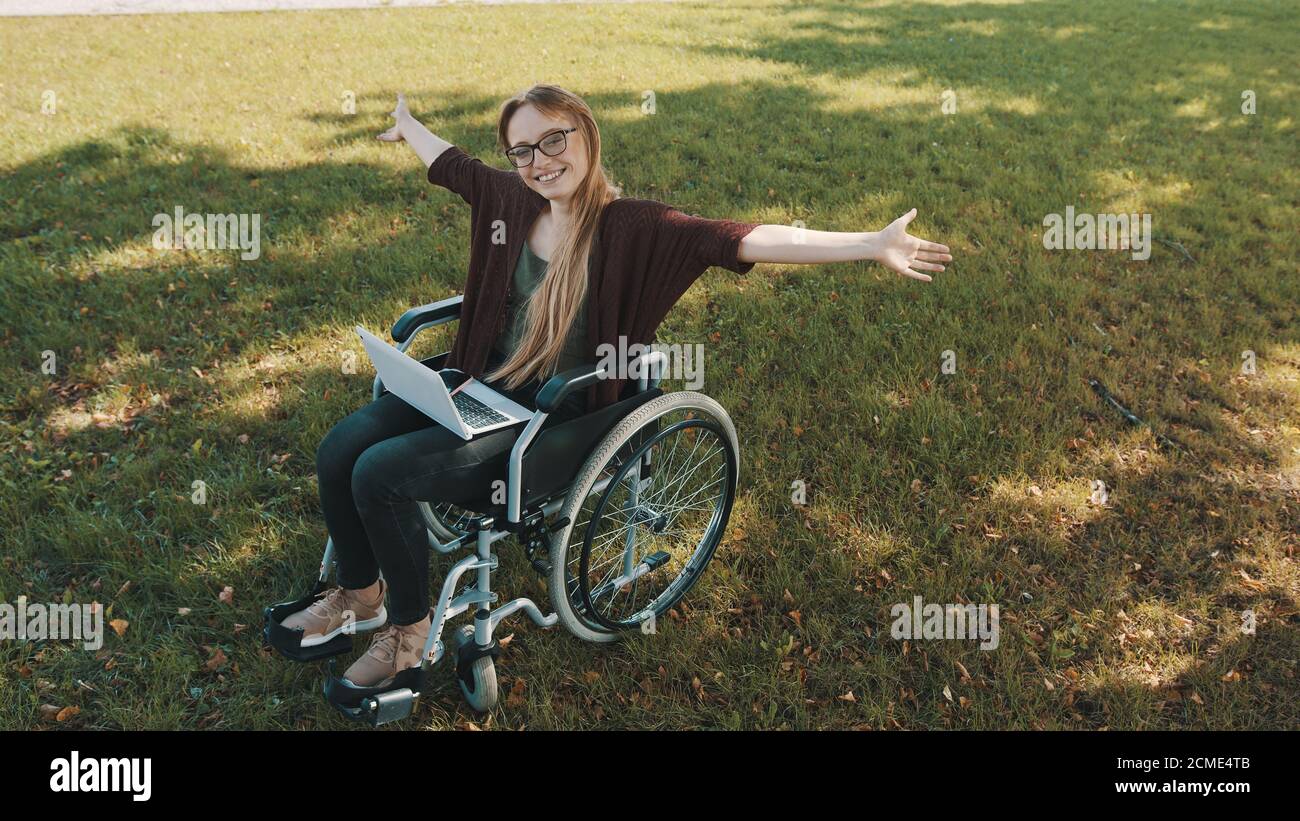 Woman in wheelchair celebrating hi-res stock photography and images - Alamy
