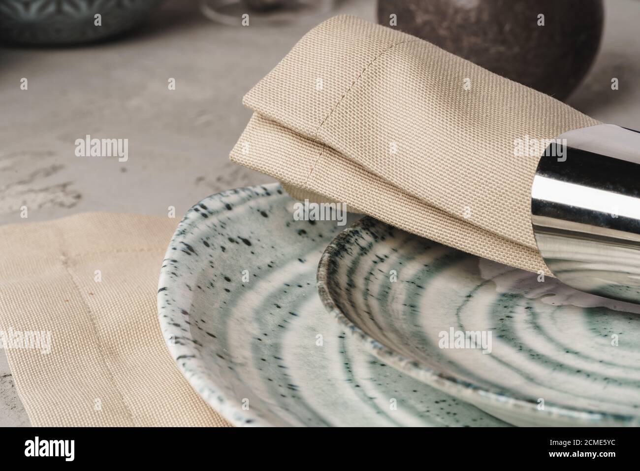 Ceramic stylish tableware set on grey background Stock Photo