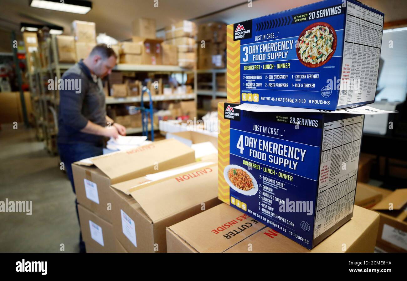 An employee double checks a customers order for a personal protection and survival equipment kit preparing against novel coronavirus, at Nitro-Pak in Midway, Utah, U.S. February 27, 2020.  REUTERS/George Frey Stock Photo