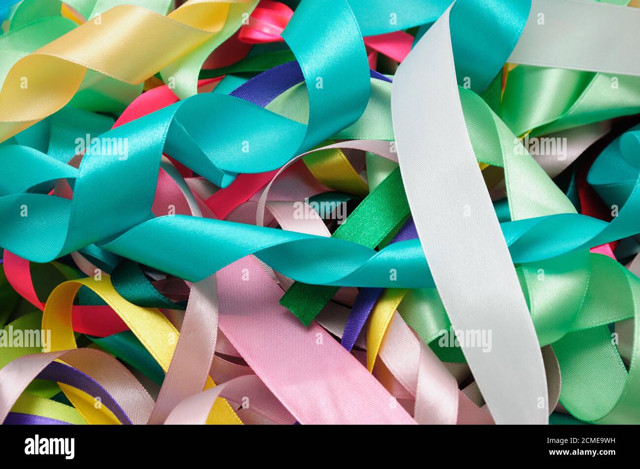 Multi-colored satin ribbons Stock Photo