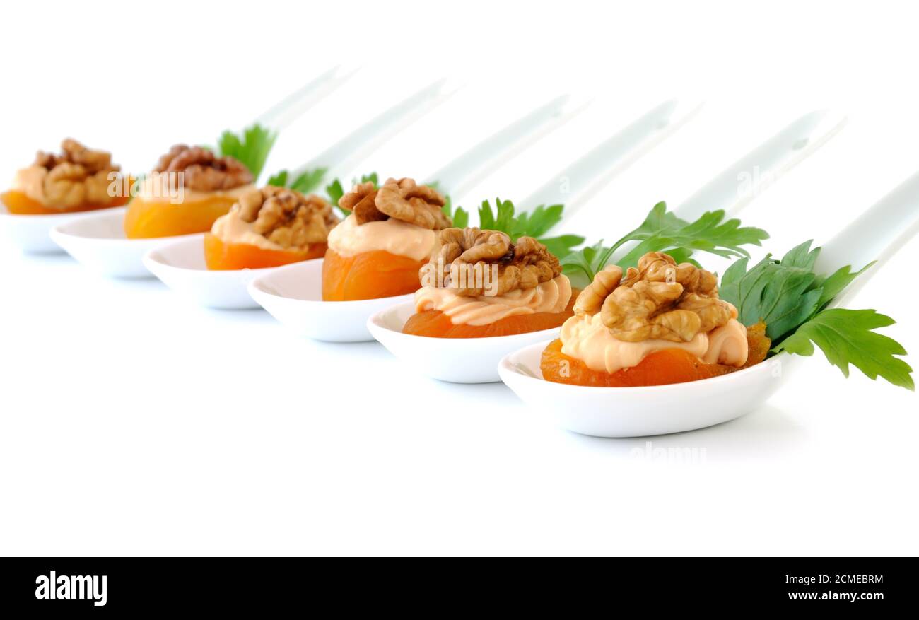 Apricot   stuffed with creamy apricot stuffing with walnuts Stock Photo