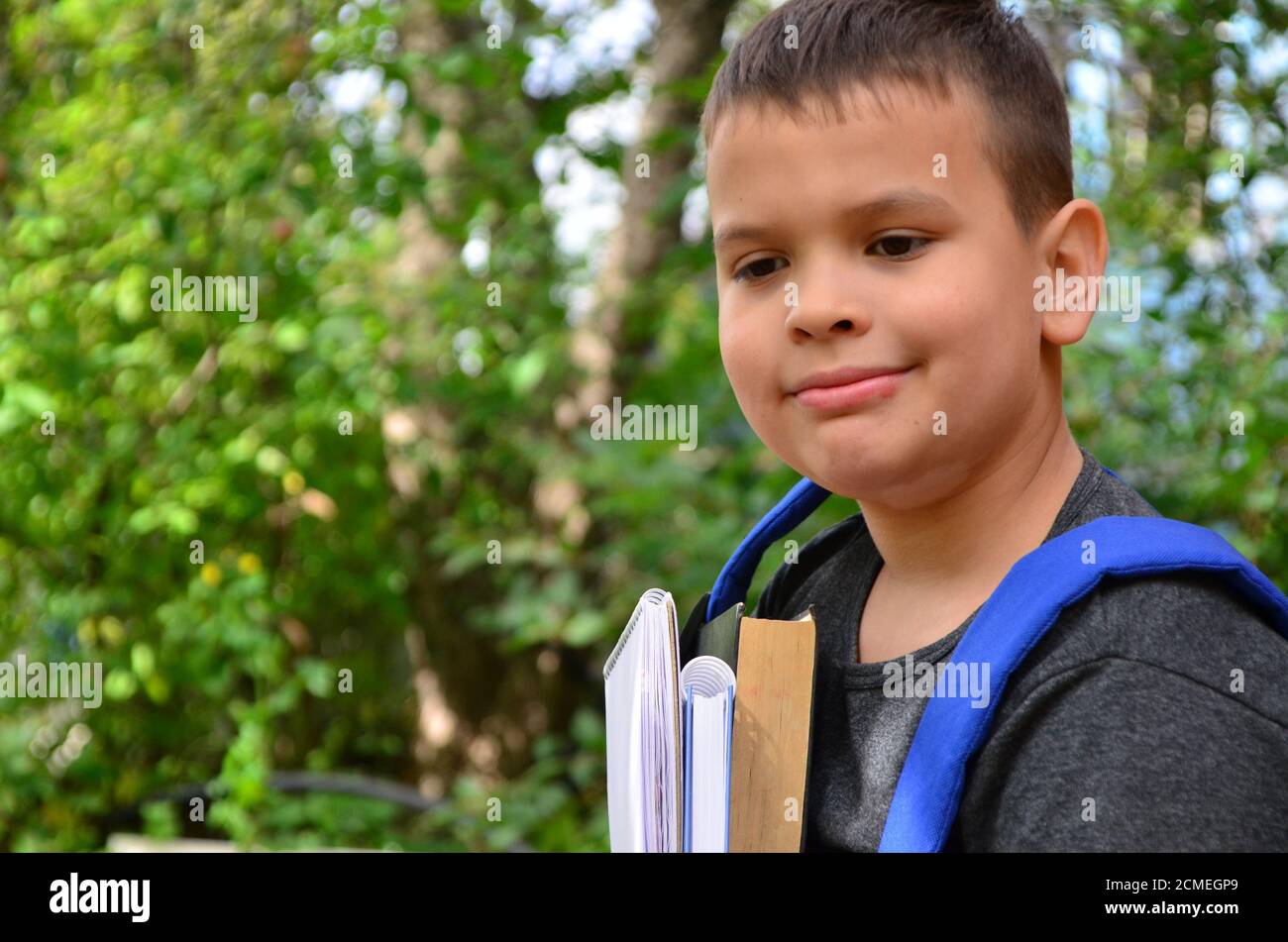 Preteen boy smiling camera hi-res stock photography and images - Alamy