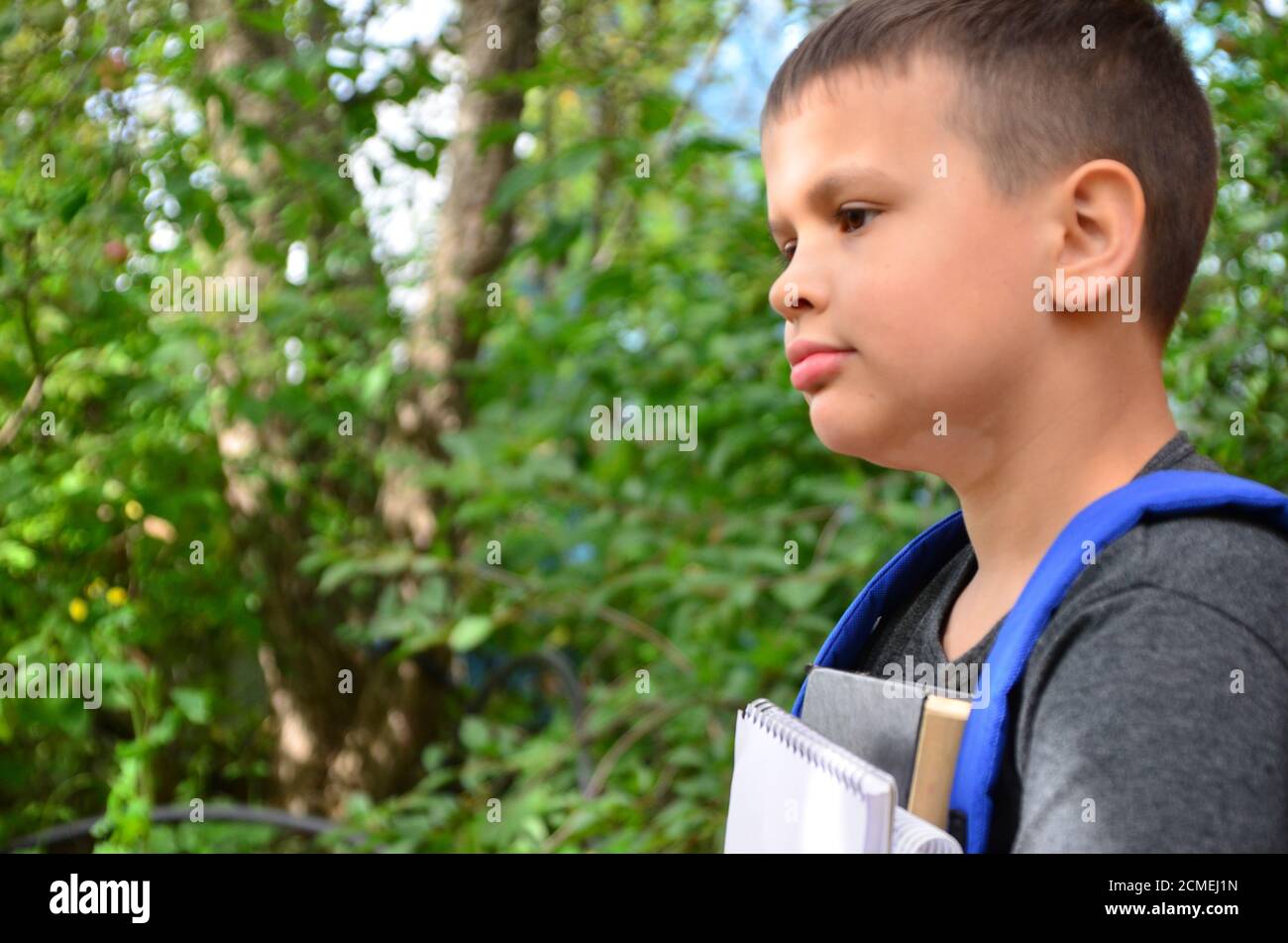 Preteen boy smiling camera hi-res stock photography and images - Alamy