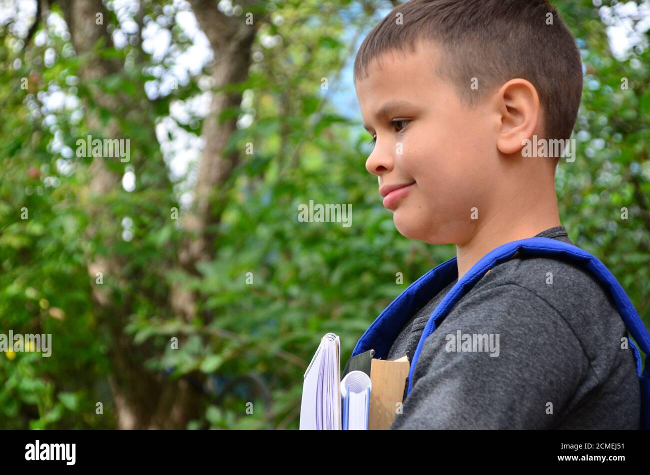 Preteen boy smiling camera hi-res stock photography and images - Alamy