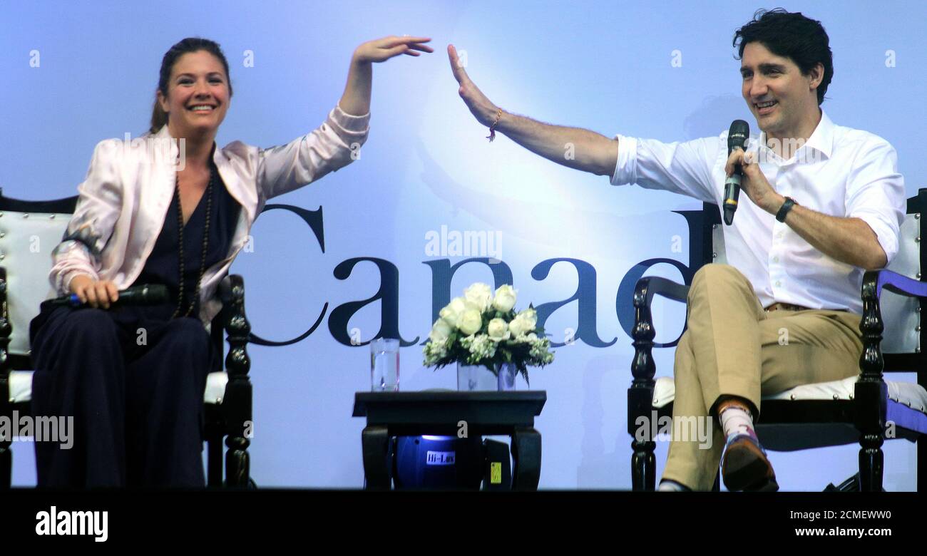 Canadian Prime Minister Justin Trudeau with wife Sophie Gregoire Trudeau gestures while speaking at the United Nations Young Changemakers Conclave, in Stock Photo
