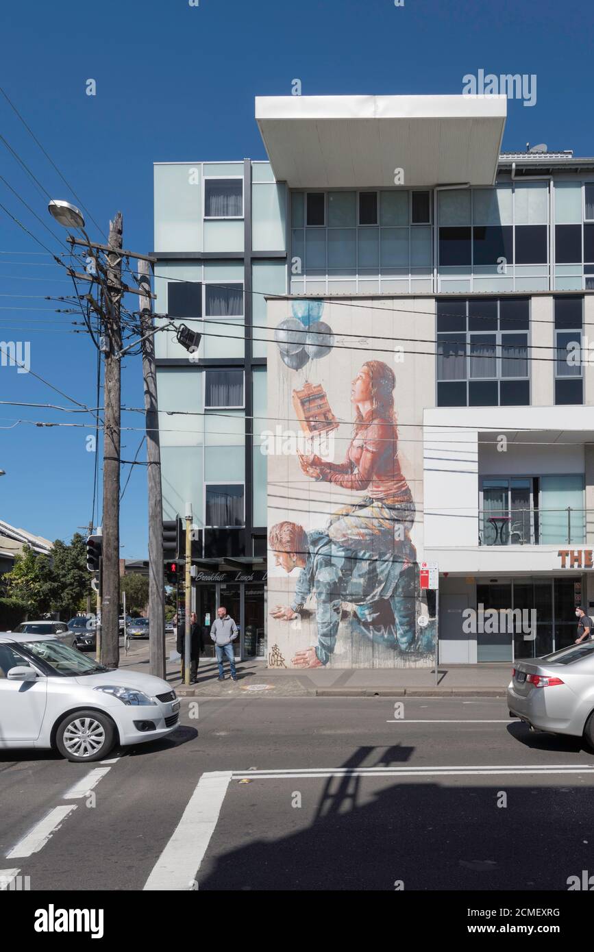 A mural entitled “The Housing Bubble” by Fintan Magee in 2015 to