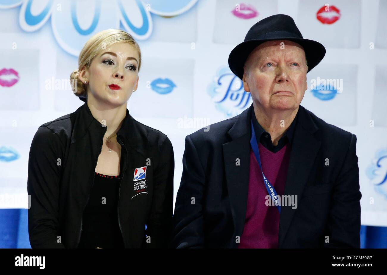 gracie-gold-of-the-us-reacts-with-her-coach-frank-carroll-in-the-kiss-and-cry-area-during-the-ladies-singles-short-program-at-the-skate-america-figure-skating-competition-in-milwaukee-wisconsin-october-23-2015-fifty-six-olympic-and-world-championship-athletes-are-competing-in-the-event-which-is-the-first-of-six-stops-on-the-international-skating-union-isu-grand-prix-of-figure-skating-series-reuterslucy-nicholson-2CMF0G7.jpg