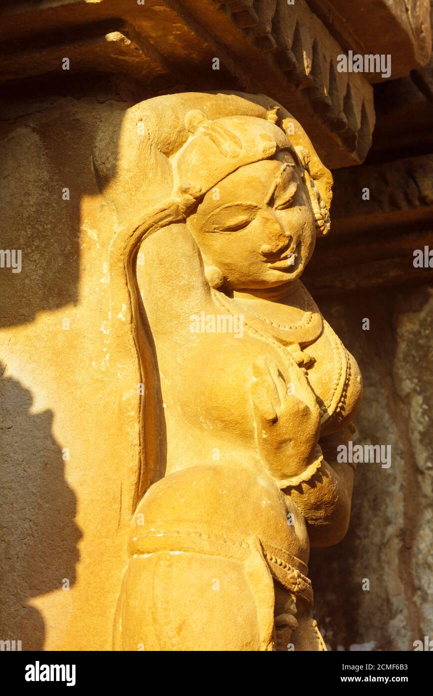 Khajuraho, Madhya Pradesh, India : Surasundari (celestial beauty) relief carvings in the in the Kandariya Mahadeva Temple of the western group of the Stock Photo