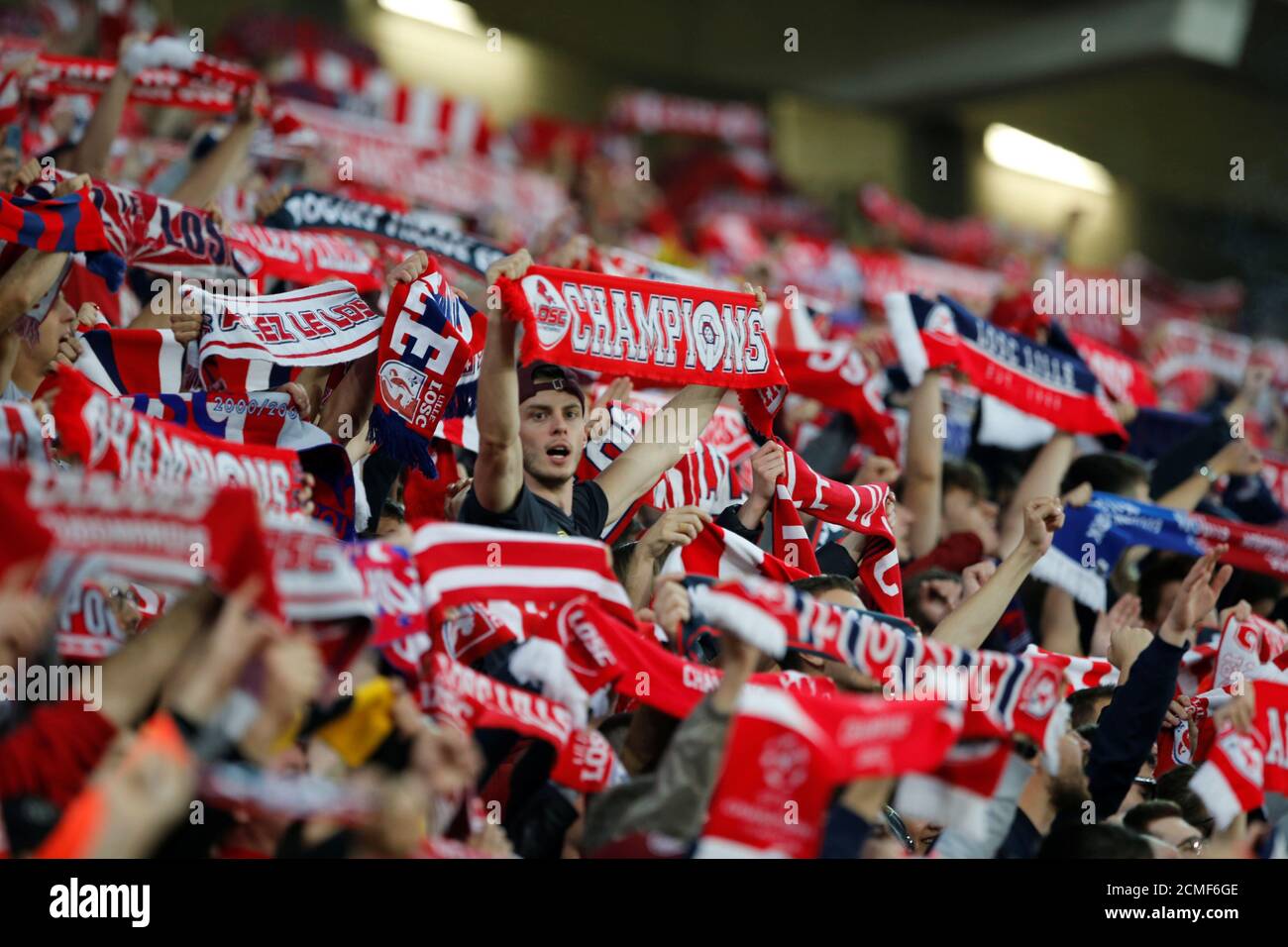 Soccer Football - Ligue 1 - Lille v Angers - Stade Pierre-Mauroy, Lille, France - May 18, 2019   Lille fans with scarves     REUTERS/Pascal Rossignol Stock Photo