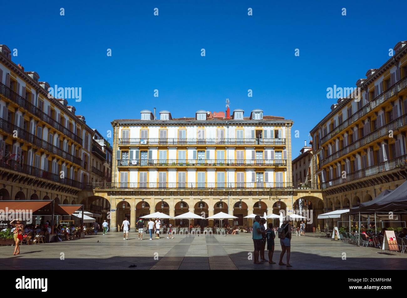 Donostia, Gipuzkoa, Basque Country, Spain - July 12th, 2019 : Passersby at Constitution Square in the Alde Zaharra old town. Stock Photo