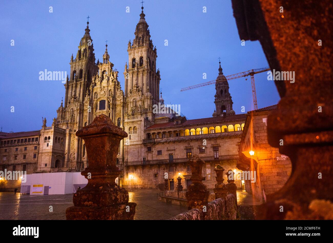 Santiago de Compostela, A Coruña province, Galicia, Spain - February 12th, 2020 : Illuminated Baroque facade of the cathedral in the Obradoiro square. Stock Photo