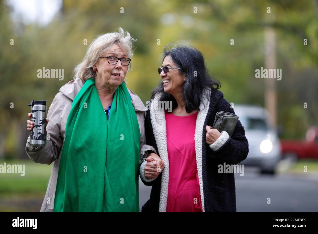 Green Party leader Elizabeth May speaks with Marilyn Redivo during an election campaign visit in Victoria, British Columbia, Canada October 4, 2019.  REUTERS/Kevin Light Stock Photo