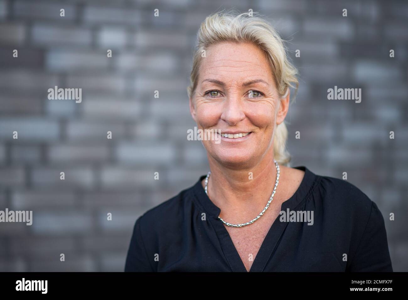 Cologne, Germany. 17th Sep, 2020. Barbara Rittner, Tournament Director of the ATP Tournaments in Cologne, stands on the sidelines of a press conference on the ATP tournaments in Cologne and smiles. Two new tennis tournaments will be held in Cologne's Lanxess Arena from 12th to 25th October. Credit: Marius Becker/dpa/Alamy Live News Stock Photo