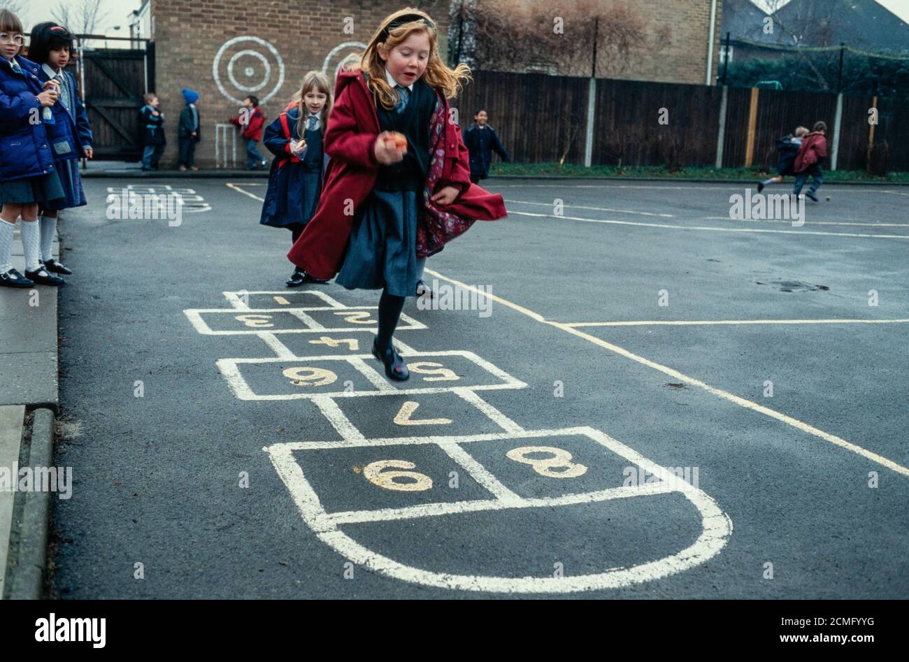 Children in the playground at Cottenham Park Primary School in Raynes Park, southwest London