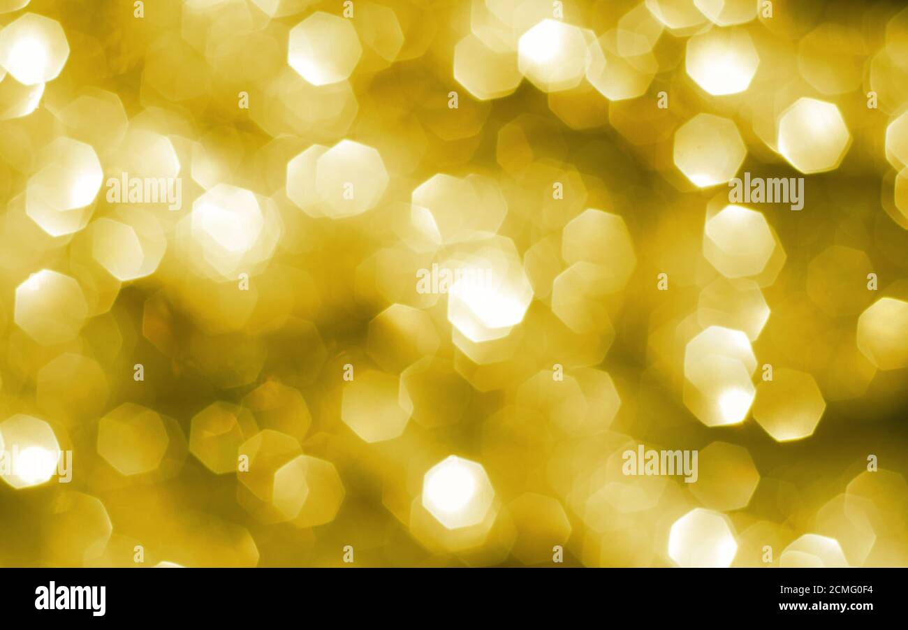 Abstract gold background with lots of bokeh Stock Photo