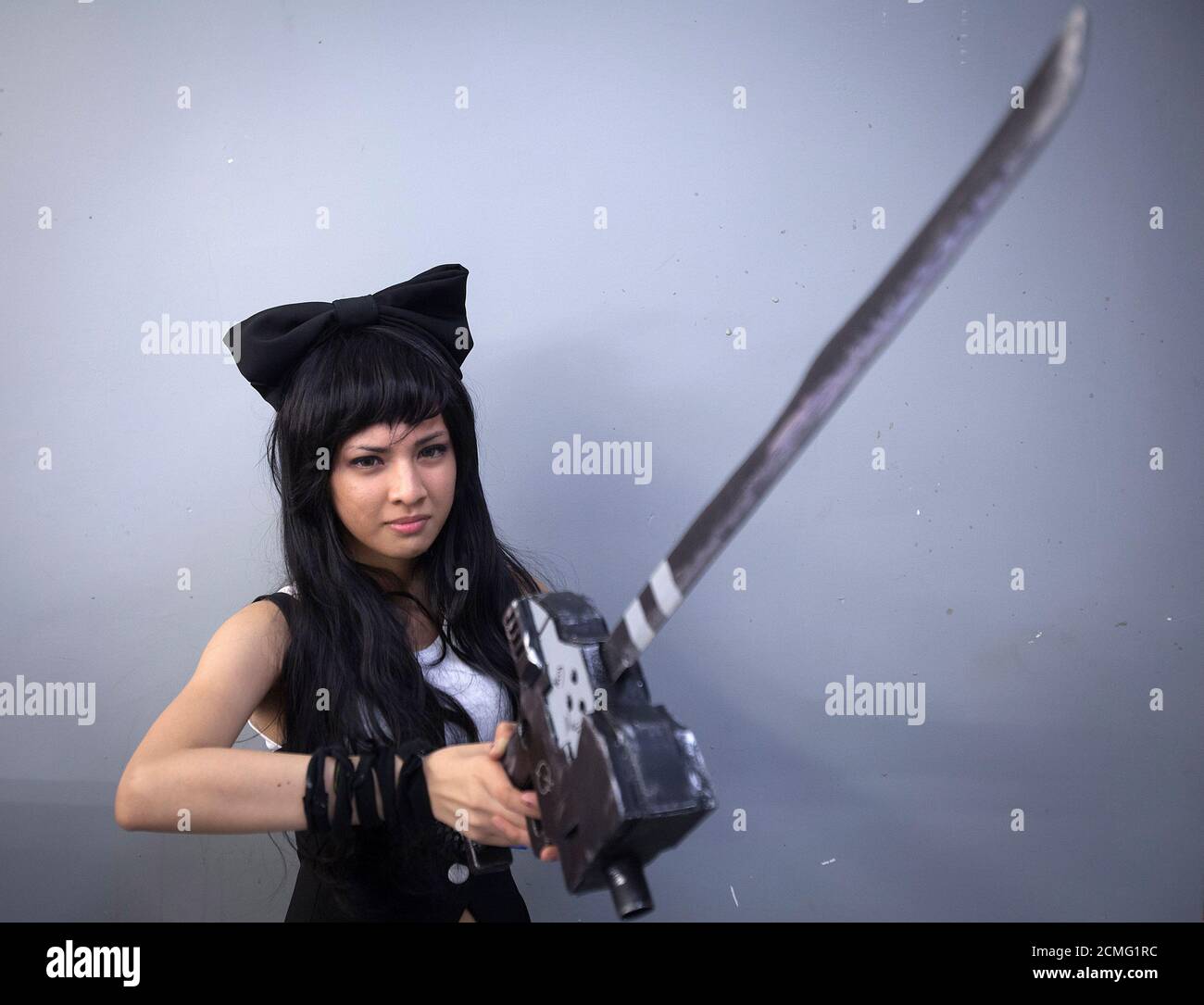 Clarisse Lampa Dressed Up As The Character Blake Belladonna From The Rwby Animated Series Poses For A Portrait At Comic Con In New York October 12 13 New York Comic Con At The Clarisse Lampa Dressed Up As The Character Blake Belladonna From The Rwby Animated Series Poses For A Portrait At Comic Con In New York October 12 13 New York Comic Con At The