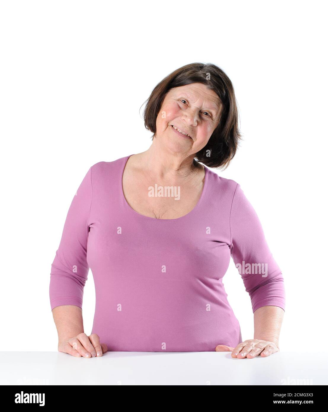 Portrait of a smiling pretty woman of retirement age. Stock Photo