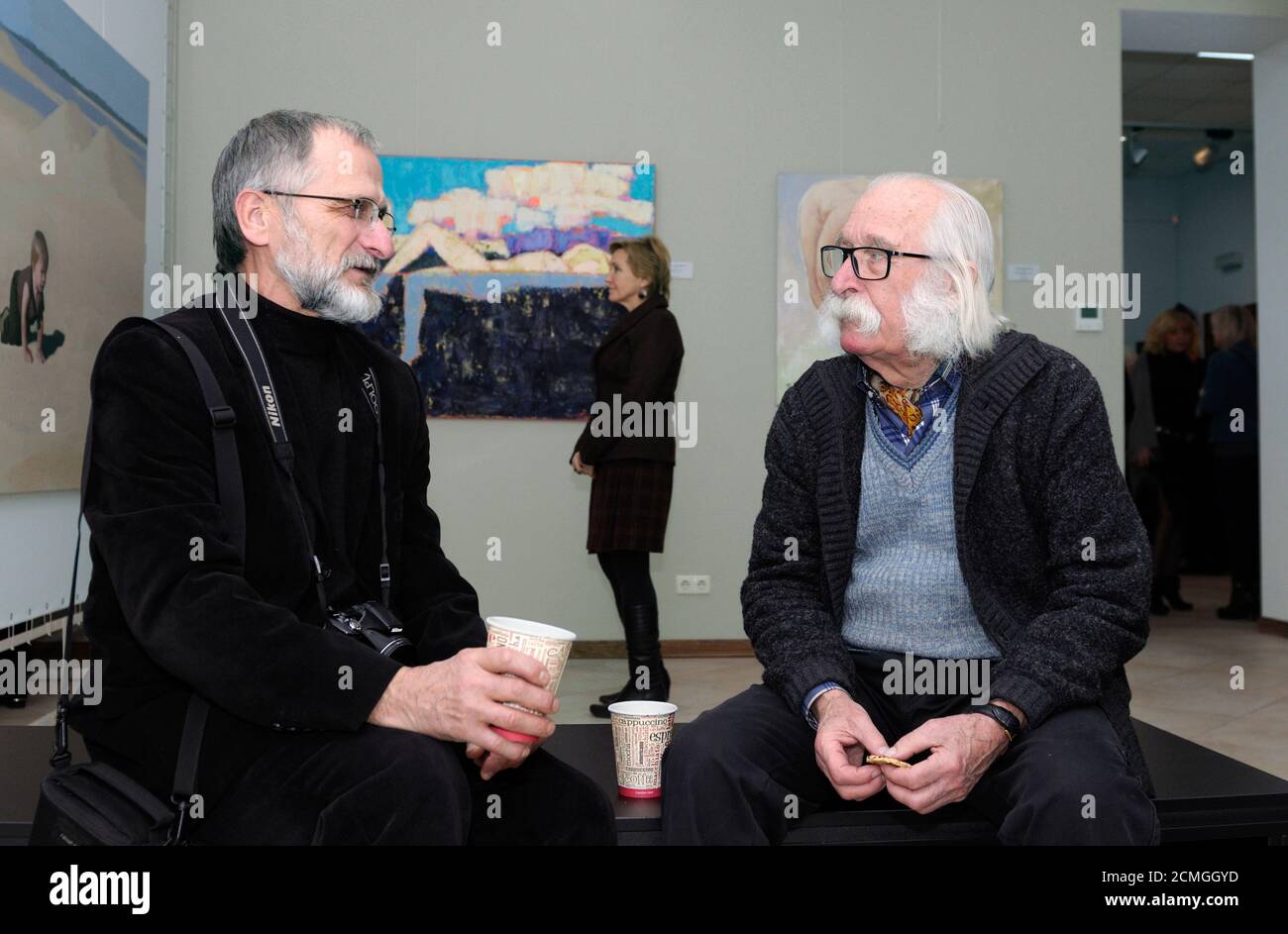 Famous Ukrainian painter Ivan Marchuk giving an interview during his solo exhibition Stock Photo