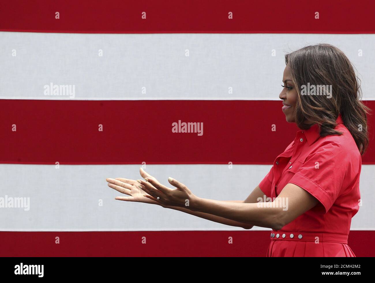 U.S. first lady Michelle Obama gestures during her visit to the U.S. Army Garrison at Vicenza, northern Italy, June 19, 2015.  REUTERS/Stefano Rellandini Stock Photo