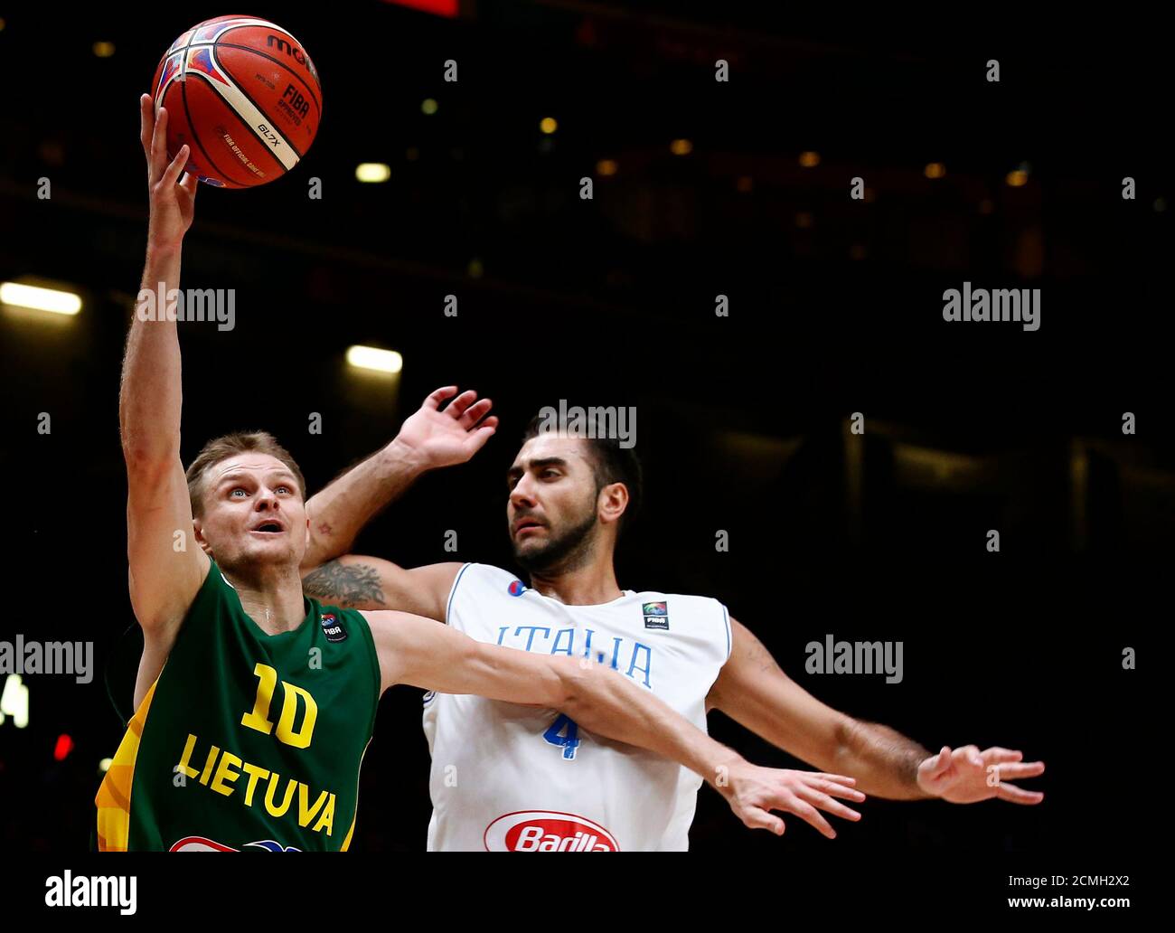 Lithuania S Renaldas Seibutis L Goes Up For A Basket Over Italy S Pietro Aradori During Their Eurobasket 2015 Quarter Final Game At The Pierre Mauroy Stadium In Villeneuve D Ascq Near Lille France September 16