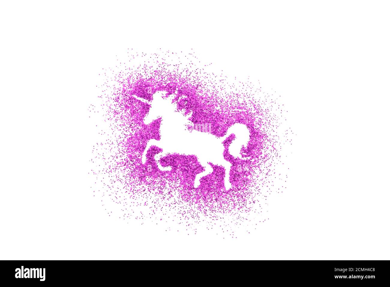 Unicorn shape on pink glitter over white background Stock Photo
