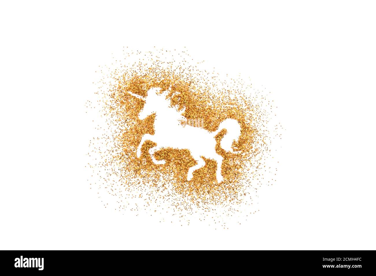 Unicorn shape on golden glitter over white background Stock Photo