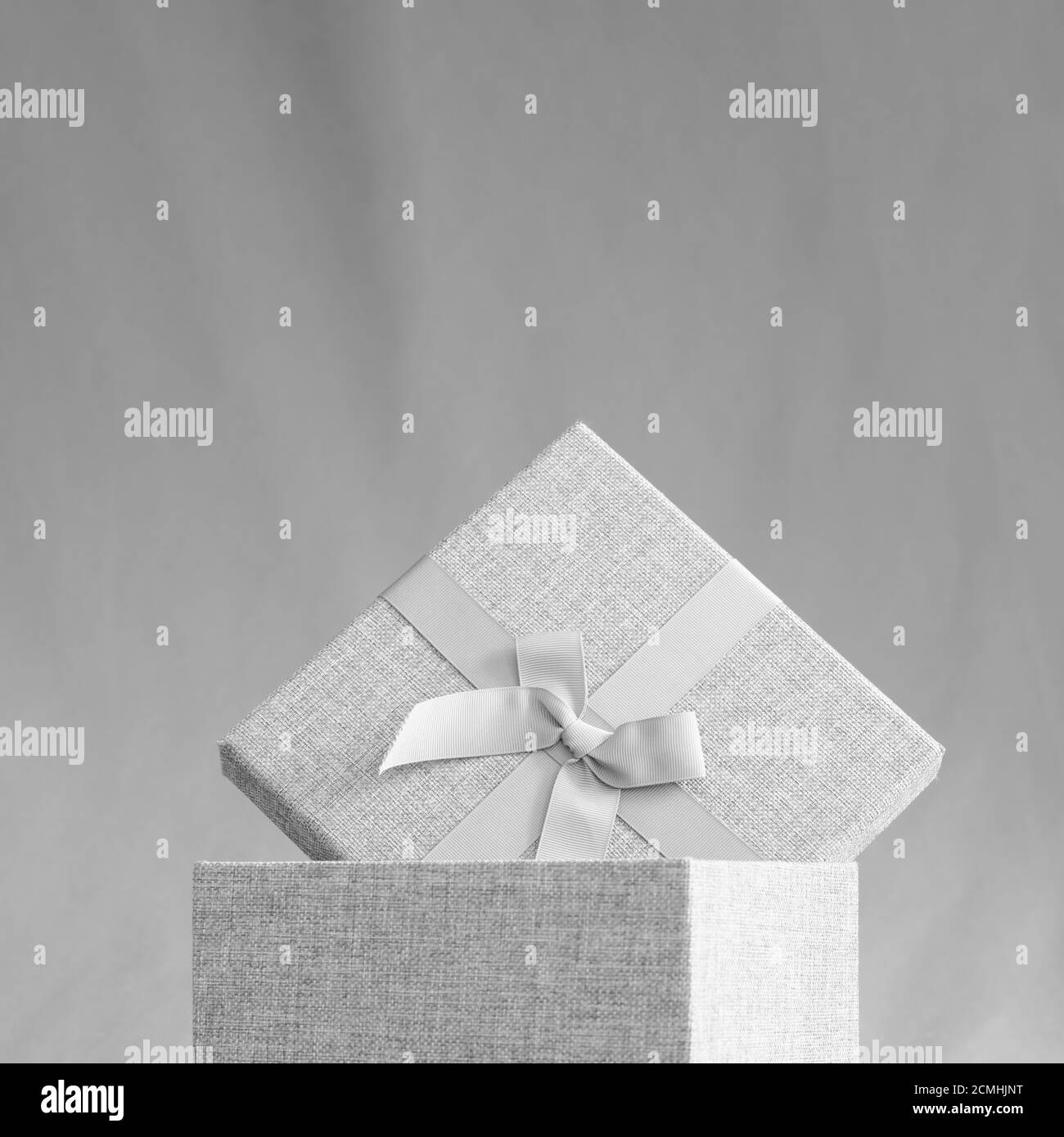 dark grey gift box with upper white space Stock Photo