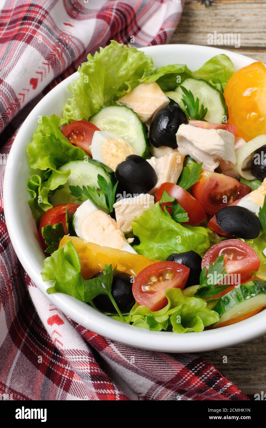 Vegetable salad with chicken and eggs Stock Photo
