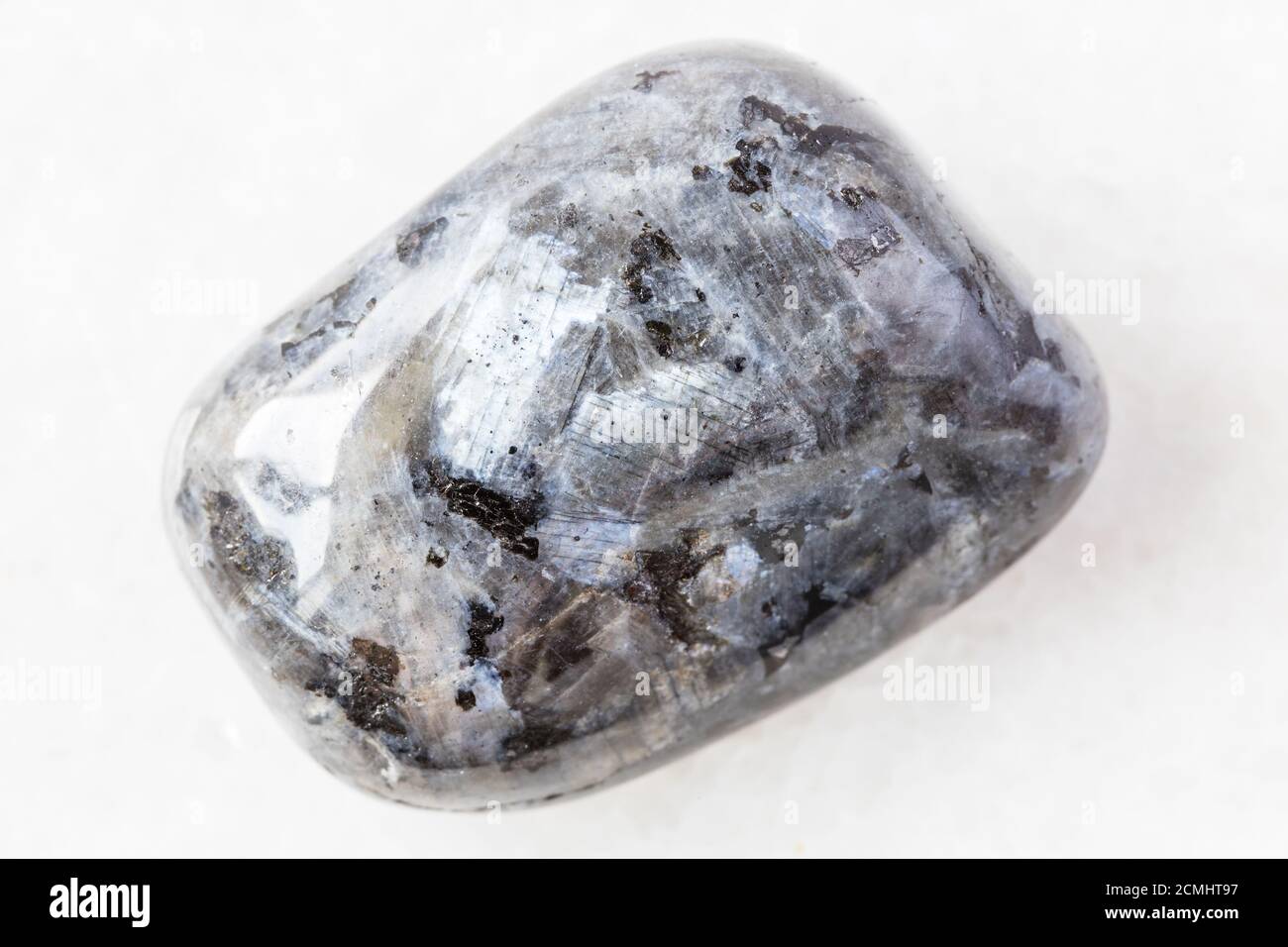 Closeup Of Sample Of Natural Mineral From Geological Collection Tumbled Larvikite Norwegian Labradorite Rock On White Marble Background From Norwa Stock Photo Alamy