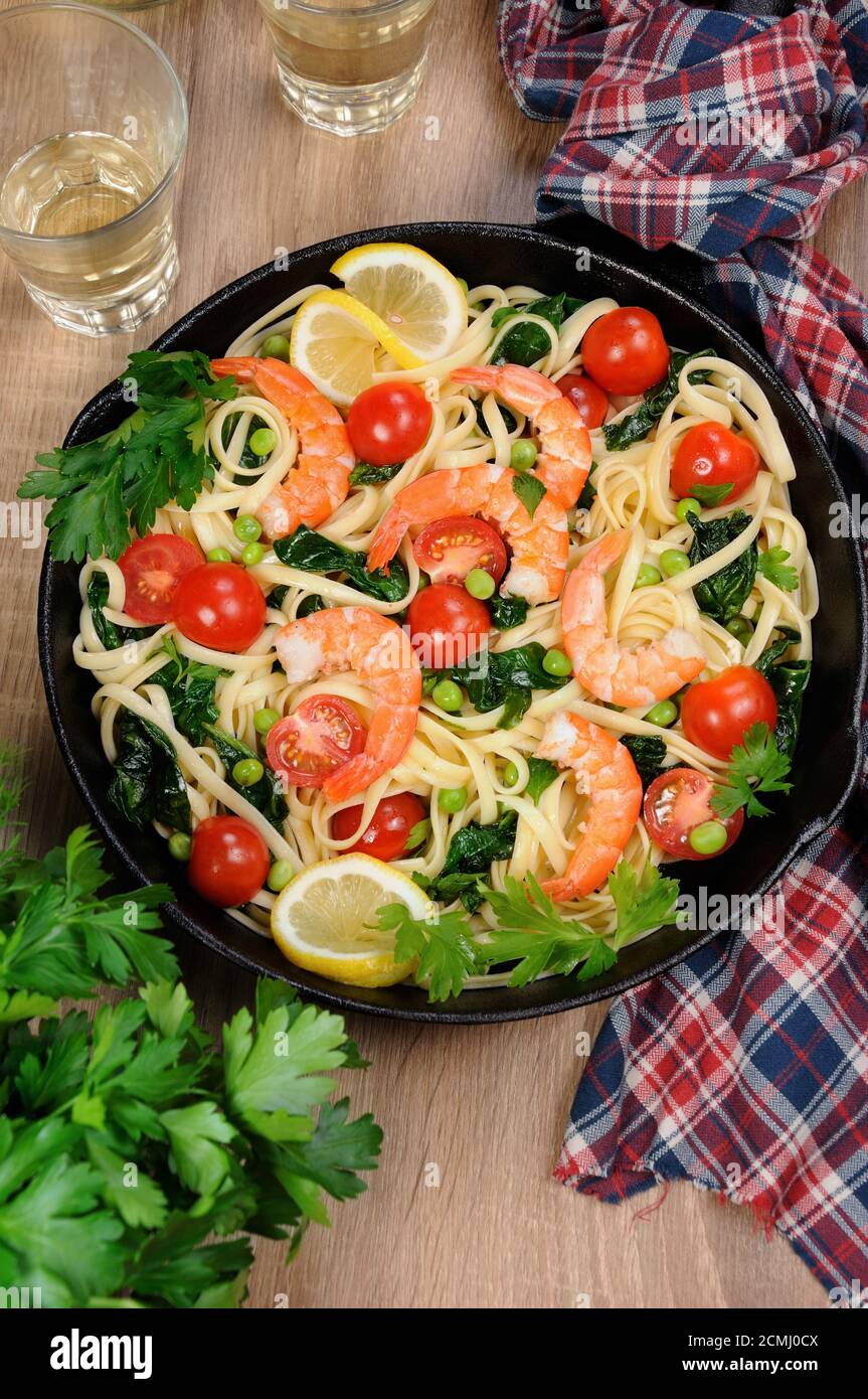 Pasta with shrimp and vegetables Stock Photo Alamy