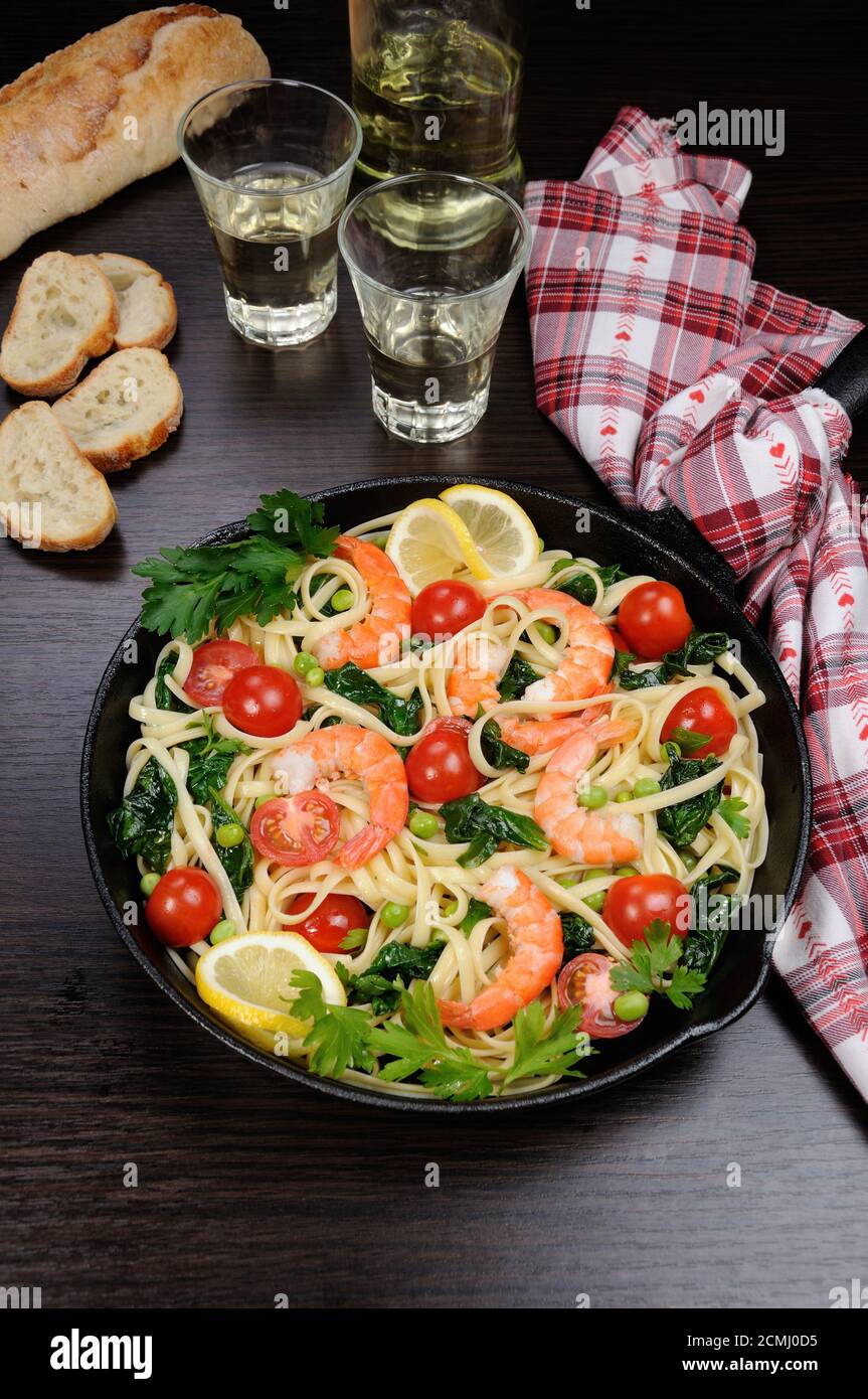 Pasta with shrimp and vegetables Stock Photo - Alamy