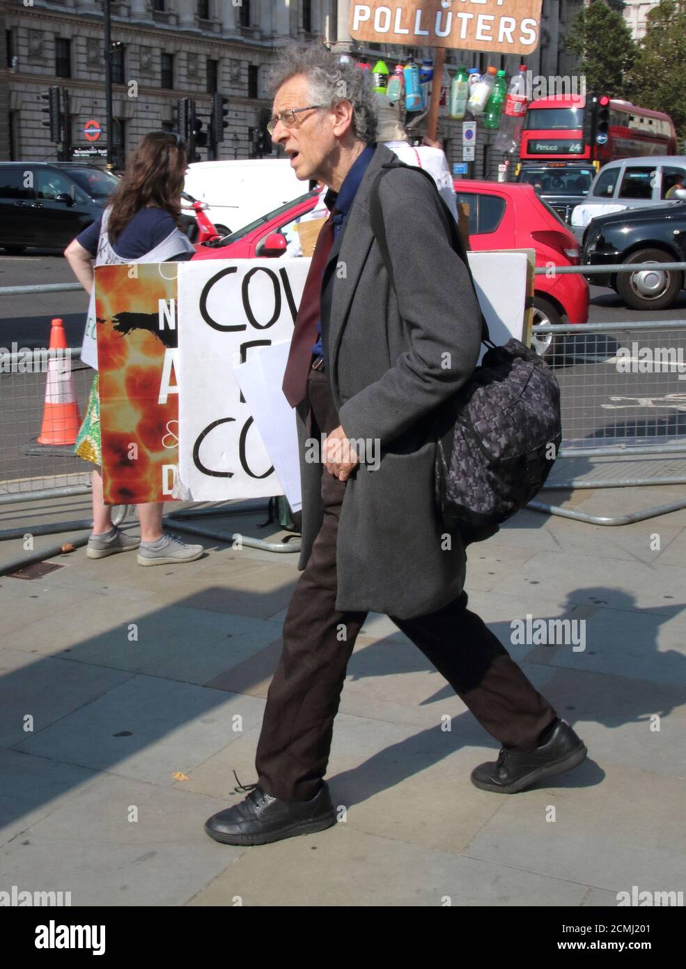 London, UK. 16th Sep, 2020. Piers Corbyn walks to Whitehall holding placards under his arm.Outspoken activist Piers Corbyn - brother of former labour Leader Jeremy Bernard Corbyn was seen campaigning opposite Downing Street, speaking to a crowd about his Covid-19 Conspiracy theory. He arrived in Westminster with several campaign placards after which he met with fellow activists in Whitehall. The astrophysicist has been addressing crowds throughout lockdown alleging Covid-19 outbreak was designed to control population. Credit: SOPA Images Limited/Alamy Live News Stock Photo