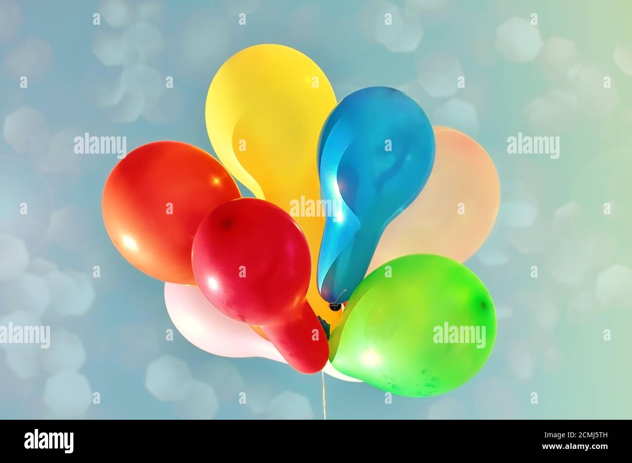 Multicolored balloons against the sky Stock Photo