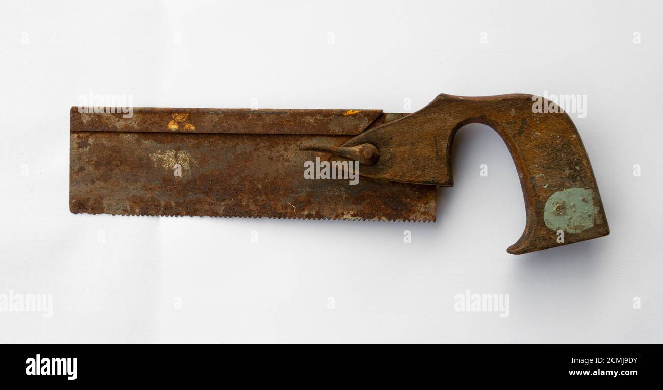 old vintage rusty tenon saw isolated on white background Stock Photo