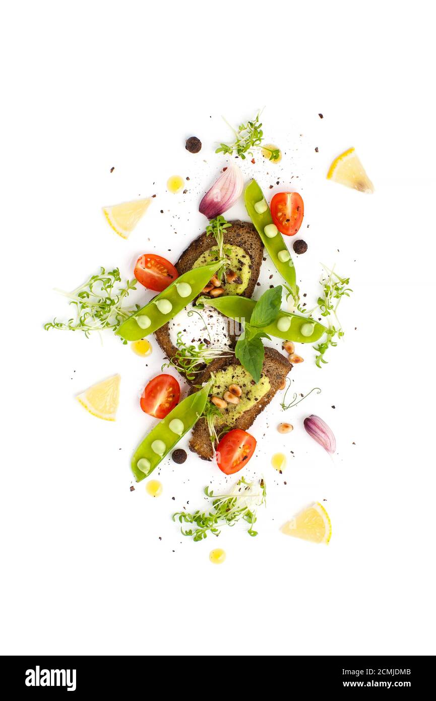 Three sandwiches with Pesto sauce and creamy cream served with young