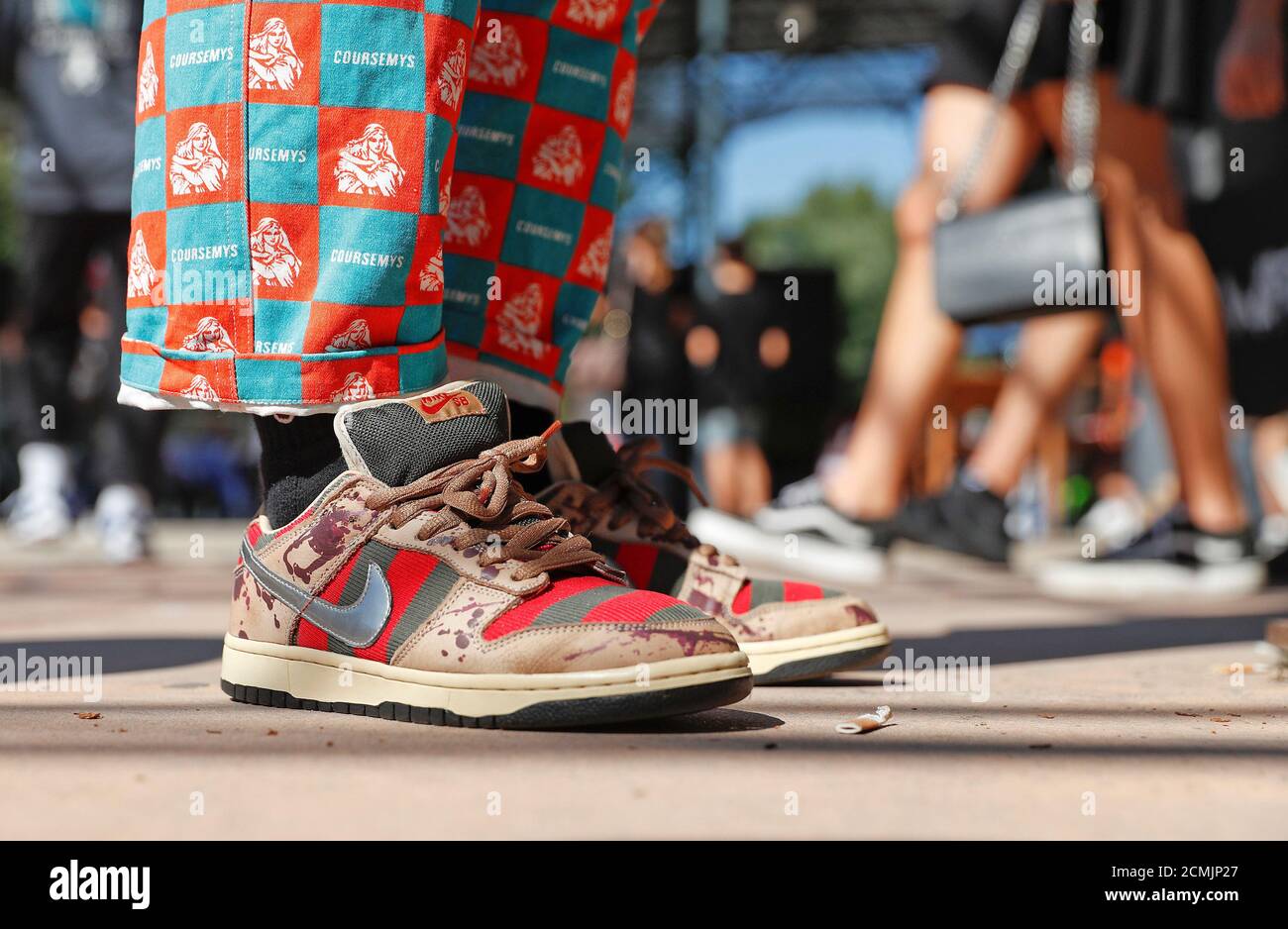 A man wears a special edition of Nike SB as he attends the KICKIT Sneaker e  Streetwear Market in Rome, Italy, September 23, 2018. Picture taken  September 23, 2018. REUTERS/Alessandro Bianchi Stock Photo - Alamy