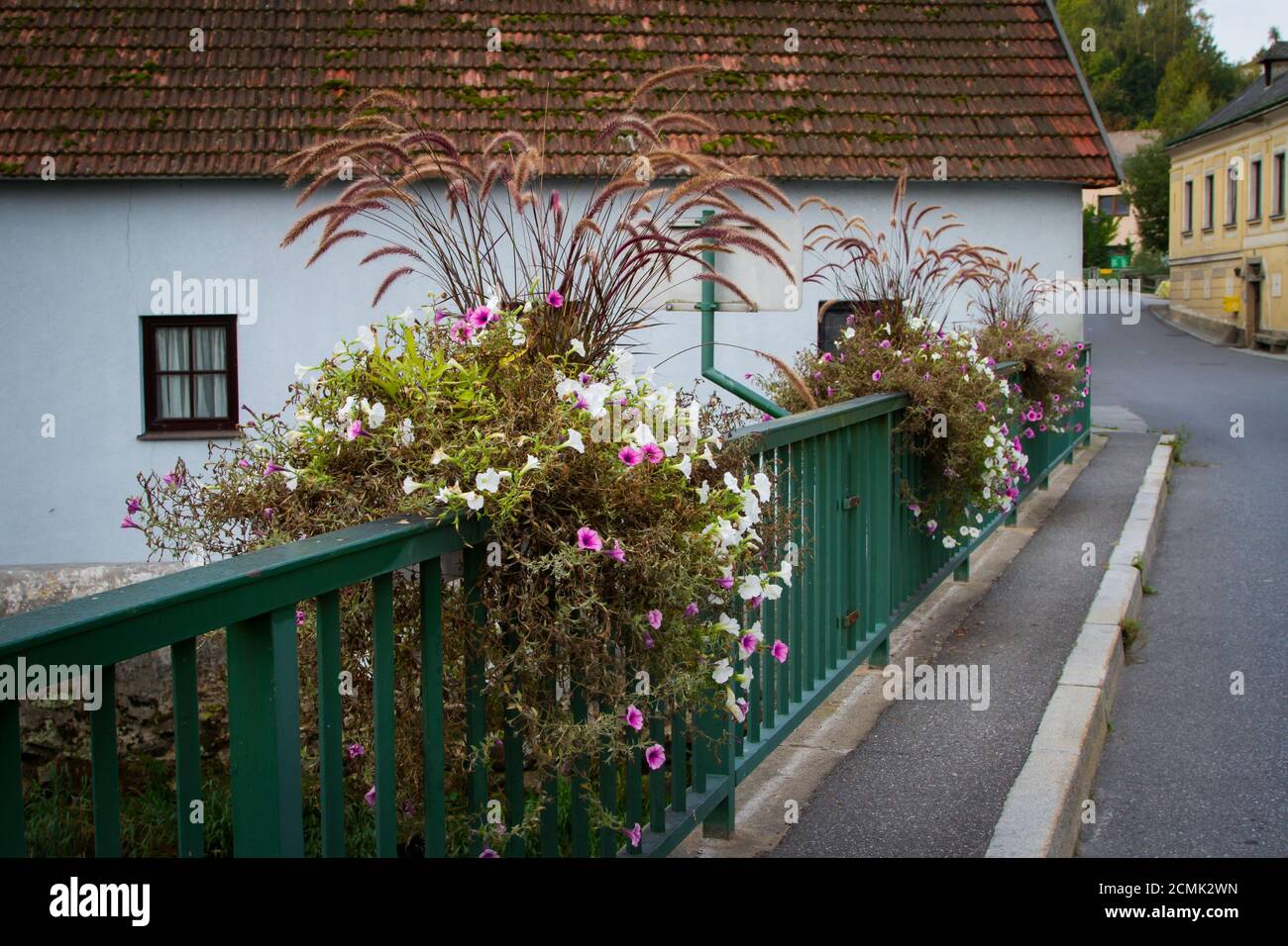 Flowers on the bridge in small town Weitra, Waldviertel, Austria Stock Photo