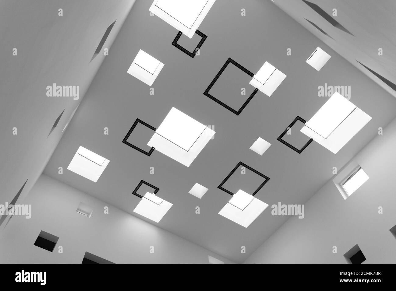 Geometric black and white skylight pattern in a ceiling Stock Photo