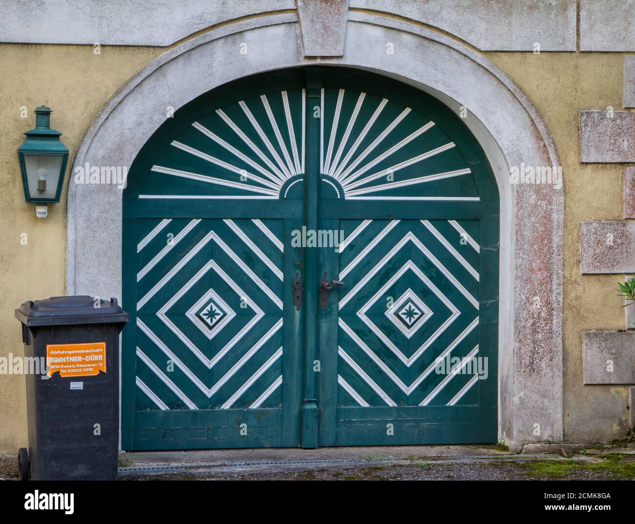 Typical entry door in the Waldviertel. Old clothing factory - textile museum in Weitra, Waldviertel, Austria Stock Photo