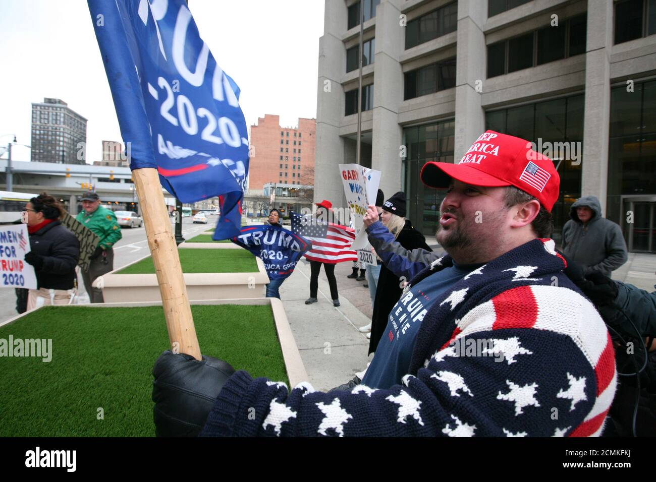 Ben Hirschmann, 24, gathers with other supporters of President Donald Trump to protest the U.S. Senate impeachment trial of the president, in downtown Detroit, Michigan, U.S. January 25, 2020. Picture taken January 25, 2020. REUTERS/Michael Martina Stock Photo