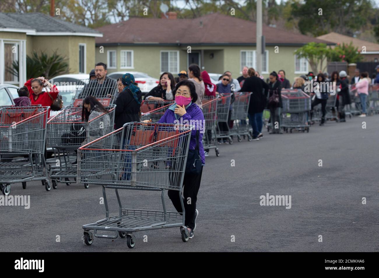 Hundreds Of Shoppers Line Up For Blocks Waiting To Purchase Supplies At A Costco Due To The Global Outbreak Of Coronavirus In Garden Grove California U S March 14 2020 Reuters Mike Blake Stock Photo