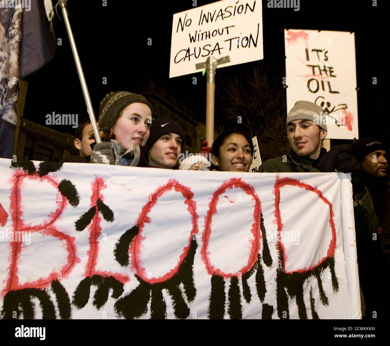 Protesters rally in Boston's Copley Square December 10, 2002 demonstrating against possible a United States military action against Iraq. The protest is one of more than 100 anti-war protest actions taking place across the United States timed to coincide with International Human Rights Day. REUTERS/Jim Bourg  JRB Stock Photo