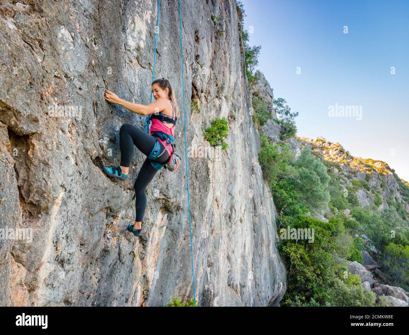 Climber woman in harness hi-res stock photography and images - Alamy