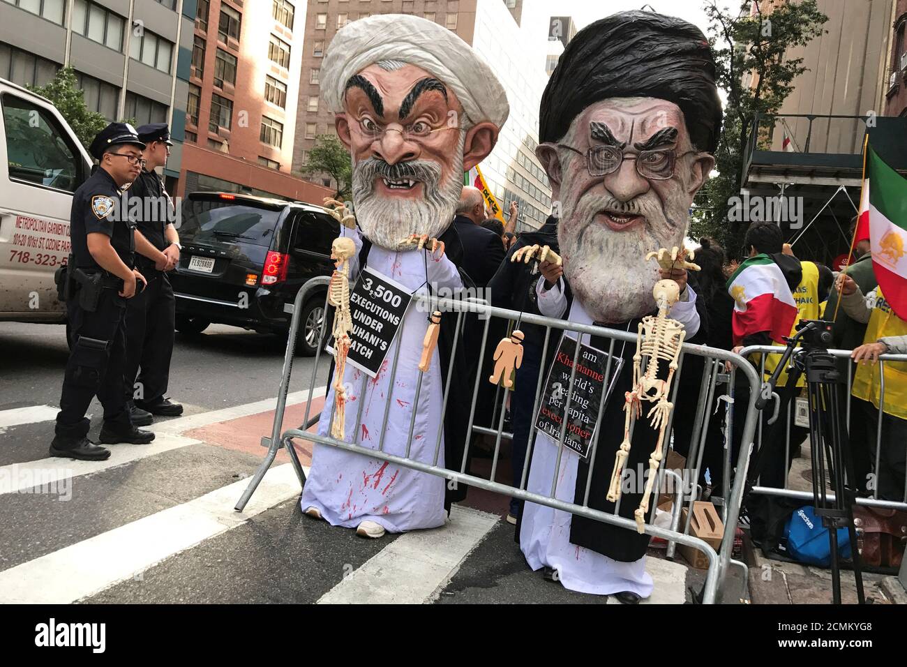 People dressed as Iran's Supreme Leader, Ayatollah Ali Khamenei and Iranian President Hassan Rouhani protest on the street against Iran in New York, New York, U.S., September 24, 2018. REUTERS/Carlo Allegri TPX