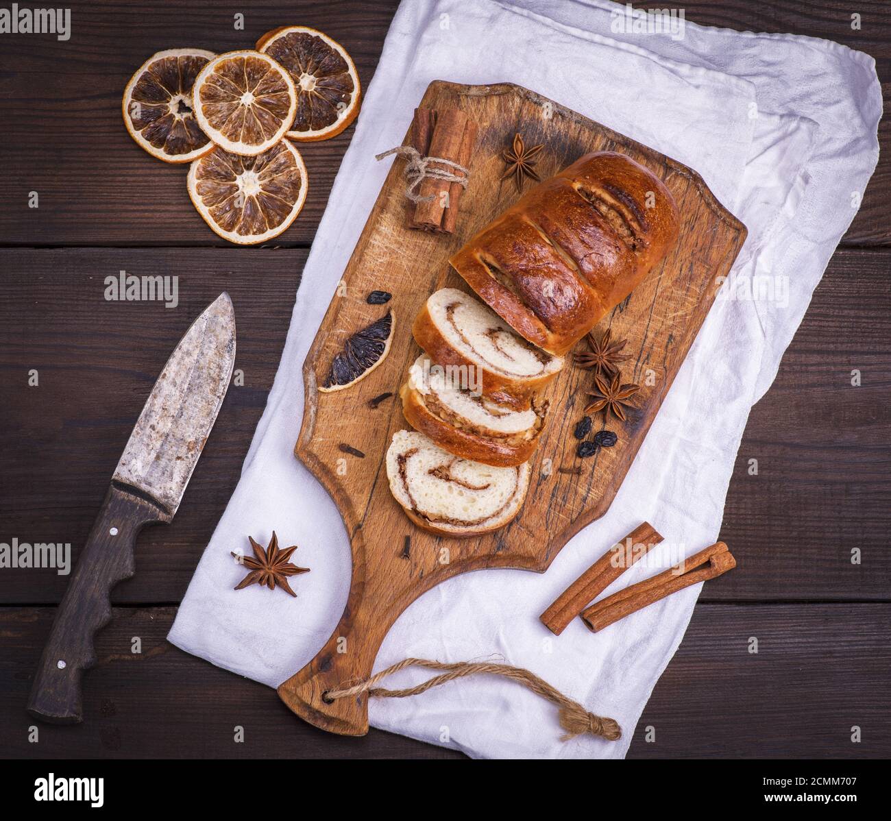 baked roll with cinnamon and nuts Stock Photo
