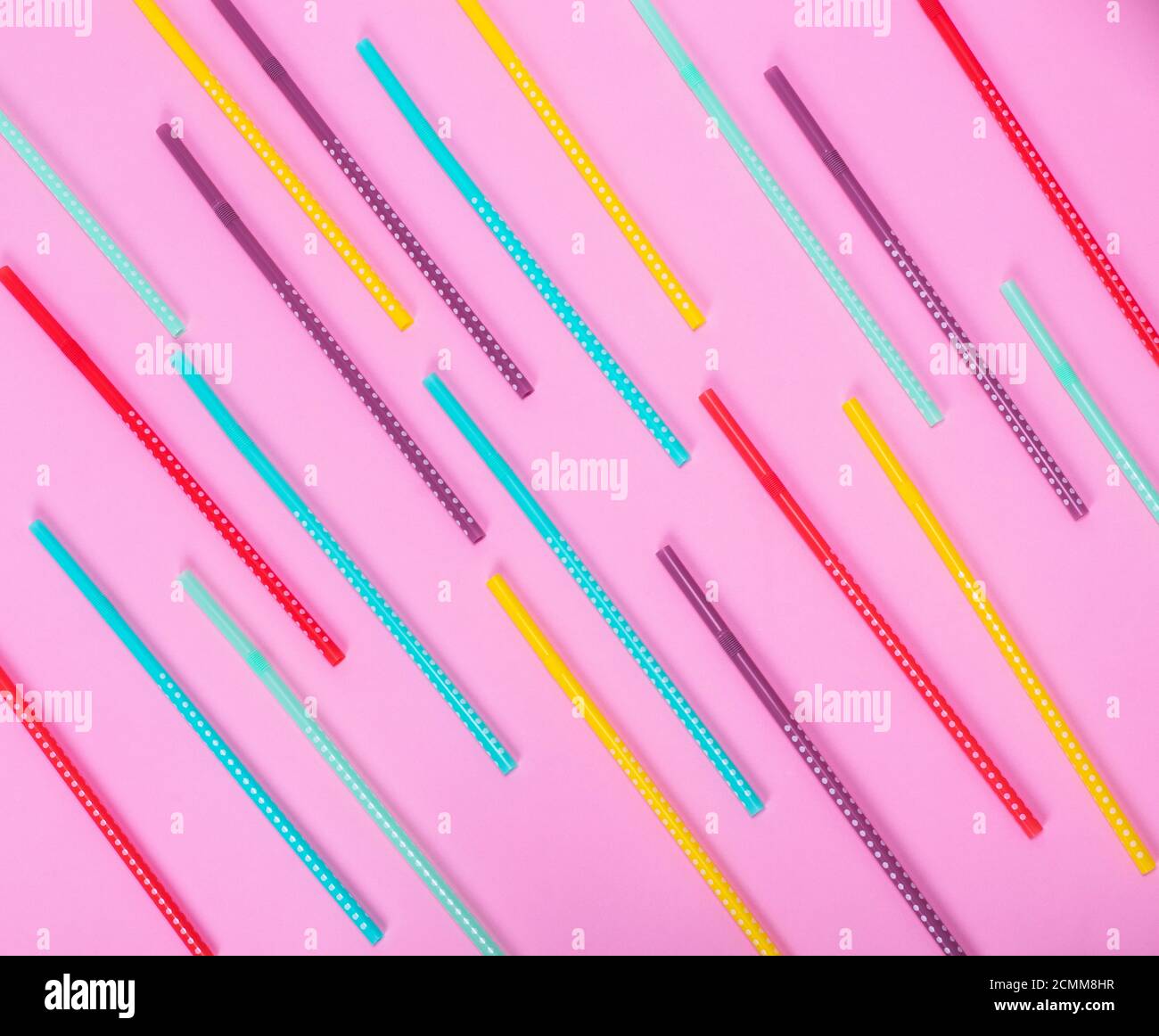 colorful plastic tube with white polka dots for drinks Stock Photo