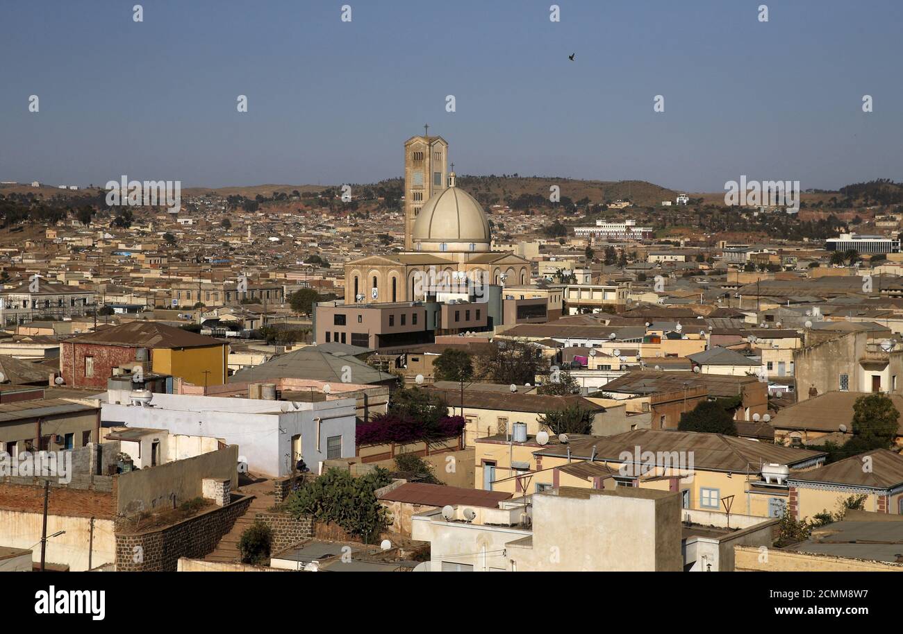 Kidane Mihret church is seen in Eritrea's capital Asmara, February 19, 2016. Eritrea's capital city boasts one of the world's finest collections of early 20th century architecture, which the authorities want declared a UNESCO World Heritage Site. When Italy's colonial experiment in Eritrea ended in 1941, it left behind an array of Rationalist, Futurist, Art Deco and other styles of Modernism in Asmara, a city they nicknamed 'La Piccola Roma' or 'Little Rome'. REUTERS/Thomas Mukoya SEARCH 'THE WIDER IMAGE' FOR ALL STORIES Stock Photo