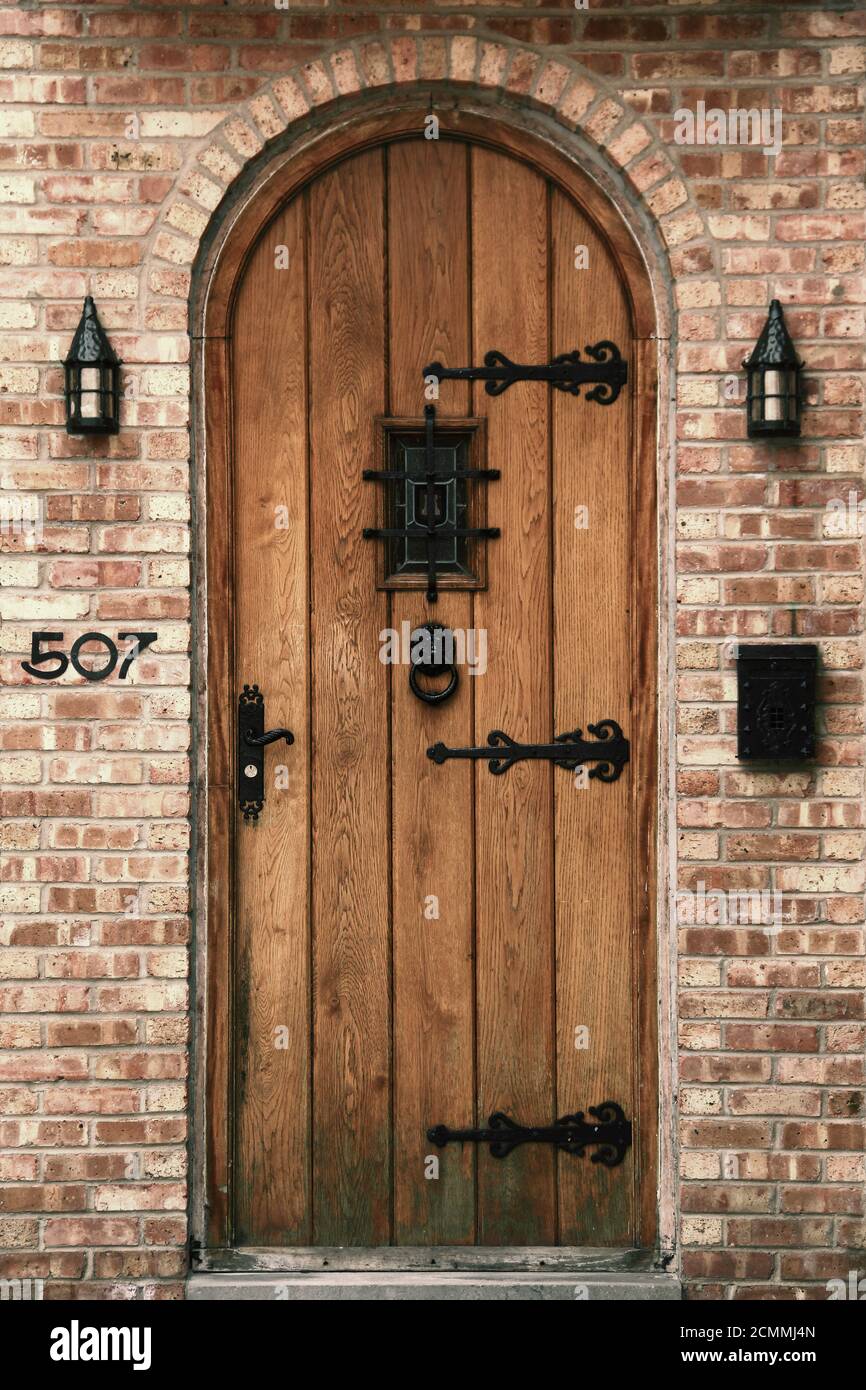 Wood door wrought iron hi-res stock photography and images - Alamy